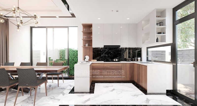 Sự phối hợp hài hòa giữa 2 tone màu chủ đạo trắng và nâu trầm mang đến một không gian nấu nướng tinh tế và không kém phần sang trọng. Thiết kế nội thất phòng bếp